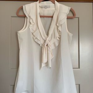 Like new blouse from Ann Taylor Loft. Only worn a few time. Tie front.
